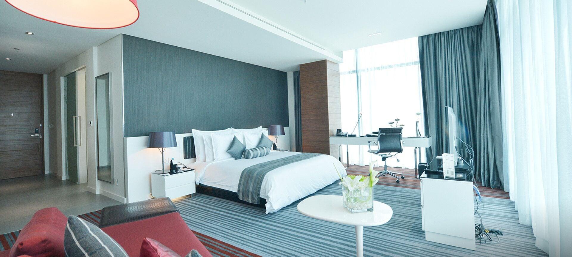 Ramee Grand Hotel And Spa Manama Eksteriør billede A bedroom in a hotel